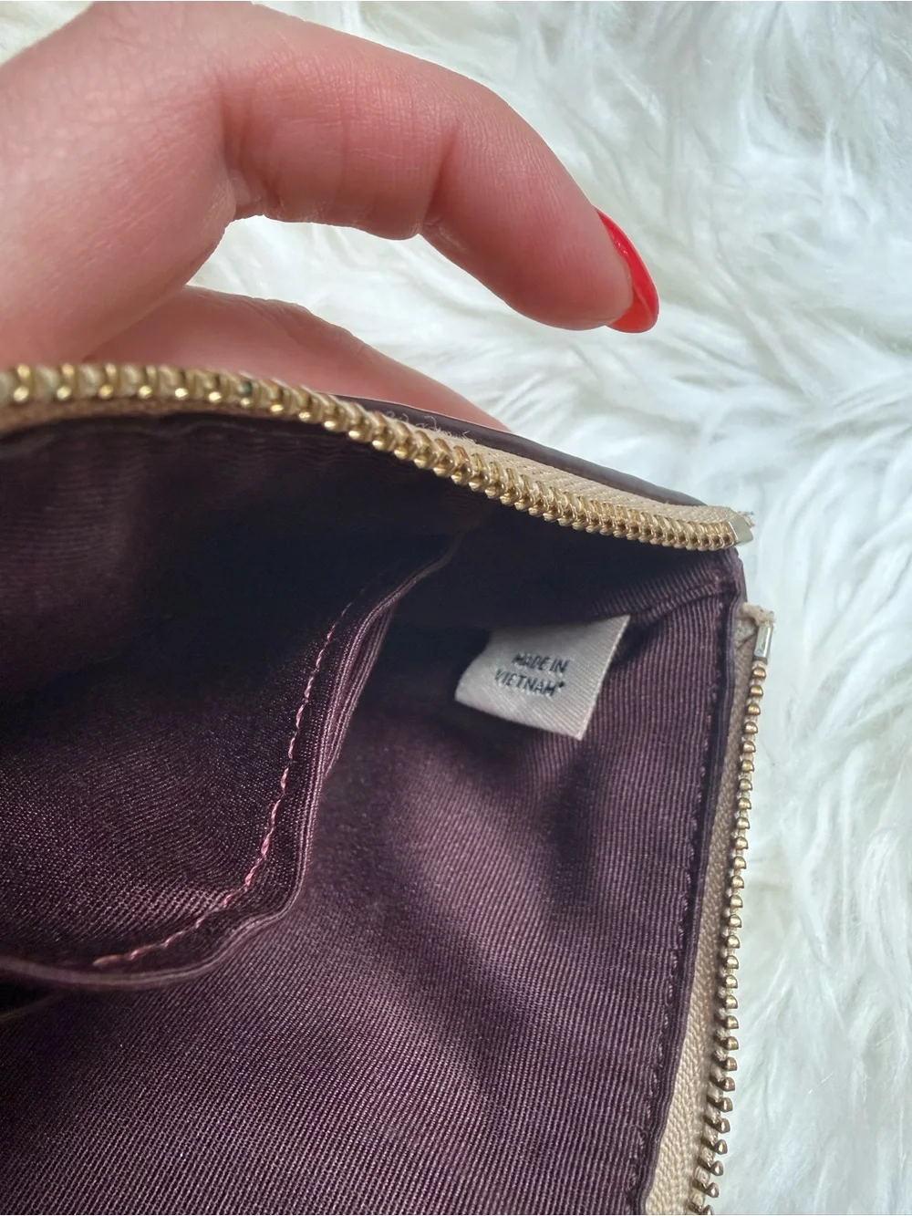 COACH Embossed Signature Wristlet in Neutral Beige